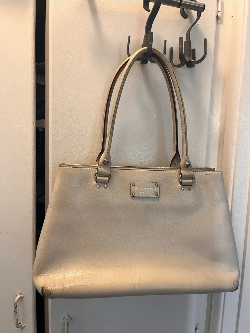 kate spade cream leather tote with gold-tone logo